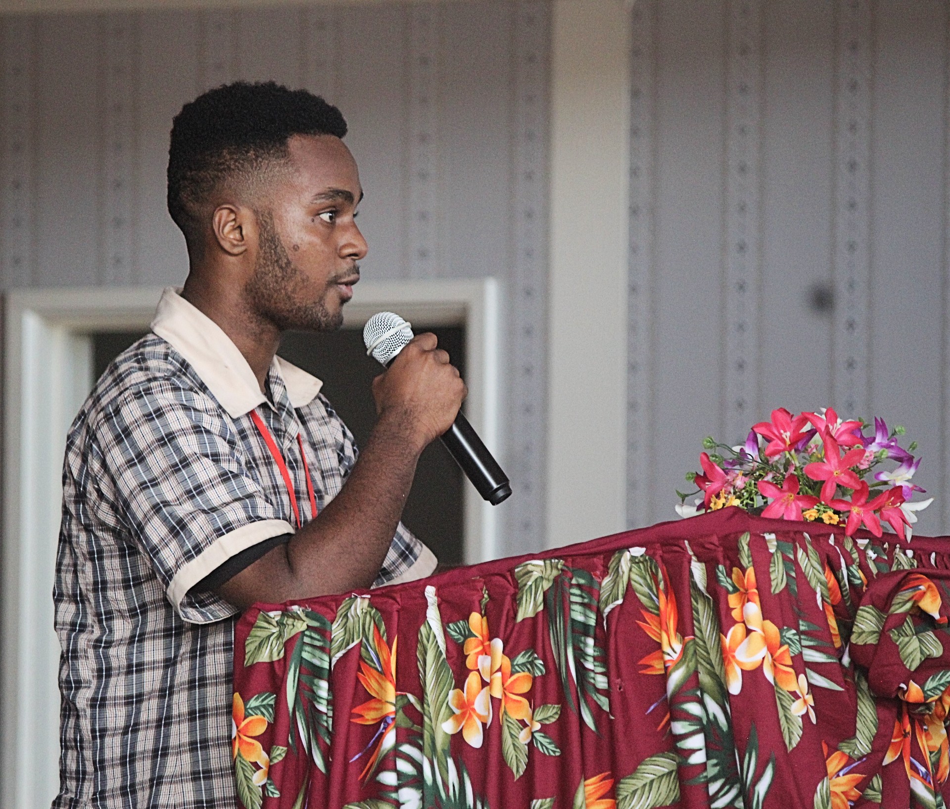 Grade 12 student and school prefect Shane Lavai speaking at the event